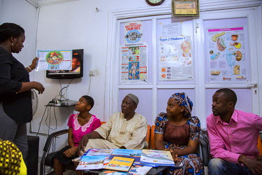 Osaikwe Chimawagbogu (47), who has type 2 Diabetes Mellitus and is also a health activist, talks to other diabetes patients about diet and health at the Rainbow Specialist Medical Centre in Lekki.