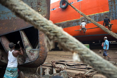 The Keraniganj shipyard on the Buriganga River in Dhaka, where thousands of workers both repair and dismantle ships, as well building new ones from the parts they recycle.