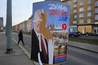 A ripped election poster of Czech president Milos Zeman who is running for second term.