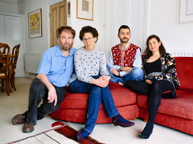 Simon Goldhill, professor of Greek literature at King's College, Cambridge, his wife Shoshana, a lawyer, and their daughter, Sarah, 27, who is studying medicine, are hosting Faraj, 21, a refugee from...