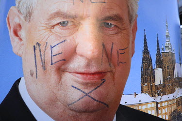 A defaced election poster of Czech president Milos Zeman who is running for second term.