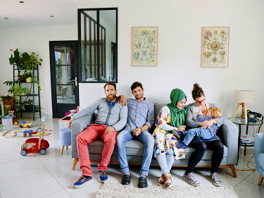 Anais and Vincent, parents of Cesar (2), left Paris in 2016 to settle in the Lyon region. Their new life has allowed them to open their doors to an Afghan refugee couple, Zulfeqar (second from left) a...