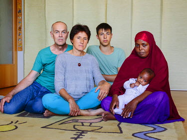 Marianne Grasl, Rolf Nagel and Leo Grasl (18) host Somali refugee Leyla Mahamud and her baby boy Zacharia who was born April 29, 2016, a few weeks after she moved in.Marianne, a primary school teacher...