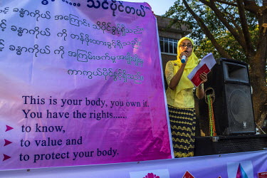 A woman speaks at an event about violence against women, which is part of the 'Women's Desire Campaign' organised by domestic NGOs including Strong Flowers Sexuality, Triangle and Myanmar Women's Self...