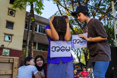 Activists perform at an event about violence against women, which is part of the 'Women's Desire Campaign' organised by domestic NGOs including Strong Flowers Sexuality, Triangle and Myanmar Women's S...