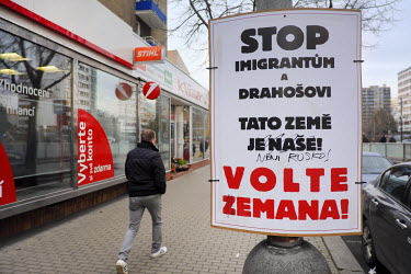 An election poster for  Milos Zeman that reads: 'Stop immigration and Drahos, this country is ours, vote Zeman'. It has been changed to 'this country is not Russia and vote Emana'.