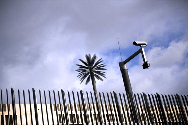 A surveillance camera and an artificial palm tree in front of the newly built headquarters of the Bundesnachrichtendienst BND, the German intelligence service agency.