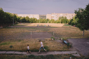 Children playing on a football pitch in the Ciocana district.