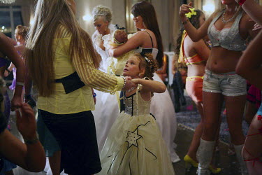 Young Irish Travellers take to the dance floor during the celebrations for a double wedding, at the Thurrock Hotel in Essex.