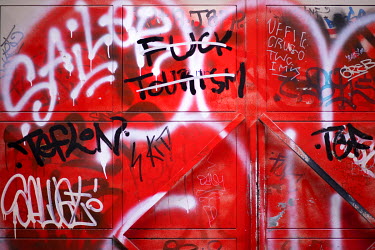 'Fuck Tourism' graffiti in Kreuzberg, a district undergoing significant redevelopment and gentrification.