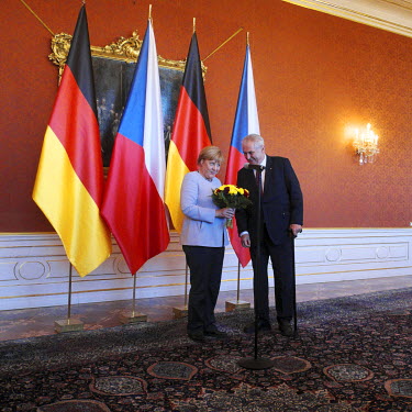German Chancellor Angela Merkel meets with Czech President Milos Zeman at the Prague Castle.