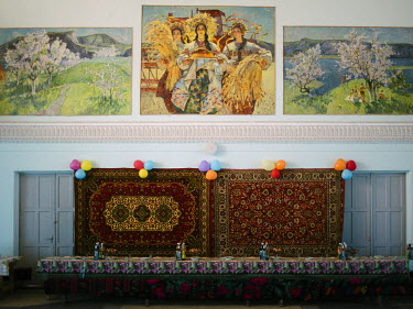 A table in the Hall of the House of Culture in Rascov village is prepared for a wedding party.