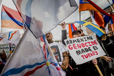 People gather for a rally on the 100th anniversary of the Armenian genocide.