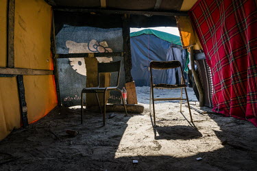 A makeshift shelter, in the so-called 'Jungle' refugee camp, that had burned down and was used as a kitchen thereafter.