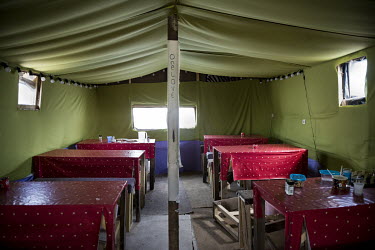 The interior of 'Sunshine', a makeshift restaurant in the so-called 'Jungle' refugee camp.