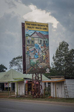 A billboard painting with the slogan: 'You have rights to quality health care' in Kayabwe a small town on the equator.