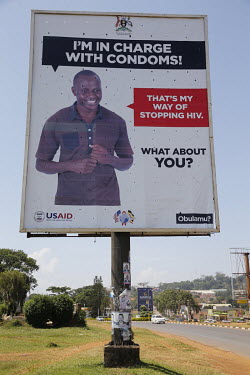 A roadside poster promoting AIDS/HIV awareness.