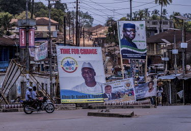 Election posters displayed on a roundabout in the town centre, ahead of elections due on 7 March 2018.