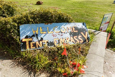 A welcome sign at the site of the Aboriginal Tent Embassy, a semi-permanent assemblage where residing activists claim to represent the political rights of Aboriginal Australians. It is made up of sign...