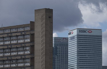 The HSBC headquaters and Citigroup Centre in Canada Square, Canary Wharf and Balfron Tower, an example of Brutalist architecture in foreground viewed from the River Lea in Bow.