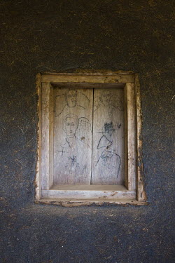 Sketches on a wooden window within the Azwa Maryam church at Zege.