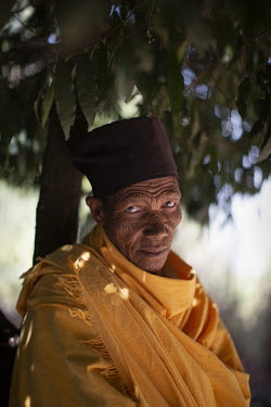 A nun in the forested grounds aof Entos Eyesus church on Lake Tana.  Forest land surrounding churches have become islands of biodiversity in seas of agriculture, the last remnants of a once-expansive...