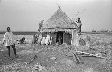 A remote Nuer cattle camp by the Baro River near the Sudanese border.