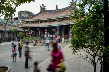 Visitors at the Bao'An Temple. The temple was constructed in 1742 and inducted into UNESCO for cultural heritage conservation in 2003.