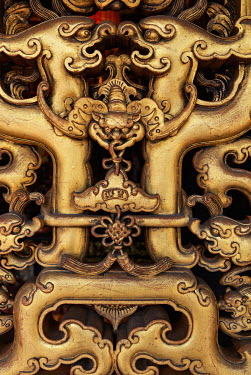 A detail of a decorative carving at the historic Bao'An Temple. The temple was constructed in 1742 and inducted into UNESCO for cultural heritage conservation in 2003.