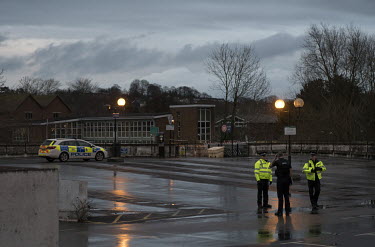 Police officers guard a Sainsbury's rooftop car park more than a week after Sergei Skripal and his daughter Yulia were poisoned with novichok, a nerve agent. The car park was one of the locations in t...
