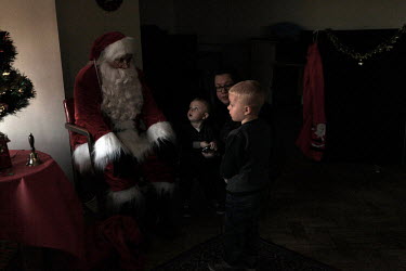 Children visit Santa Claus in the Easington Colliery Welfare Centre. It cost Â�0.75 for a child to have the opportunity to tell Santa what they want for Christmas although the fee is often overlooked...