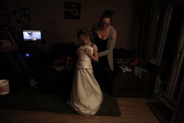 Lindsey tries her wedding dress out on her daughter Sophie (10).