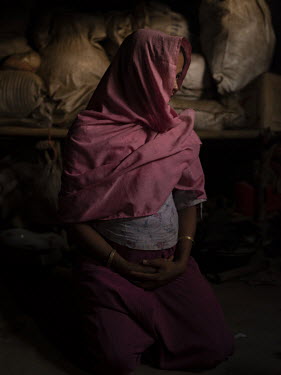 Azara [name changed to protect her identity] in a refugee camp in Cox's Bazar. Twenty-year-old Azara's gang rape and ensuing escape on foot from Bangladesh is similar to the horrific experience of man...