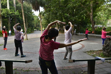 People exercising in Taipei's Botanical Garden.