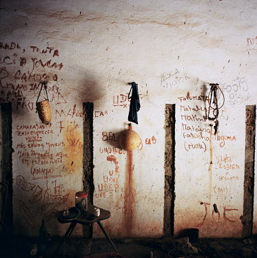 Objects used for rituals and fortune telling in a room inside of an abandoned military compound from the Portuguese colonial era.
