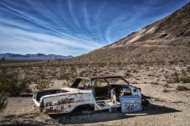 The chasis of an abandoned car in Rhyolite, a ghost town just outside Death Valley National Park.
