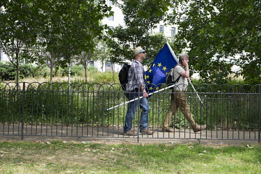 People arrive for a pro-EU, anti-Brexit march in central London.