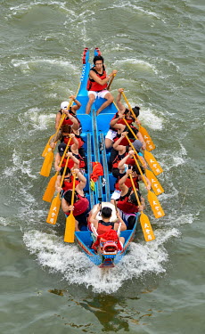 Competitors take part in the annual Dragonboat races in the Dajia Riverside Park.
