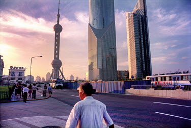 Highrise towers in the Pudong District with the distinctive 468m high Oriental Pearl Radion and TV Tower in the distance.