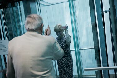 The head of the Supreme Court Malgorzata Gersdorf leaves her office waving to a colleague from the lift. Gersdorf (65) is opposing a law, passed in January 2018 by the ruling Law and Justice Party (Pi...