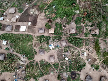 An aerial view of refugee shelters and agricultureal plots in Bidibidi refugee camp. Every refugee in Uganda is allocated a plot of land to farm, as well as being free to work or travel within the cou...