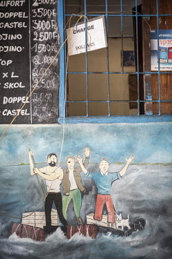 A mural from Herge's book The Red Sea Shark's painted on a wall at Chez Tintin, a bar on the banks of the Congo River.