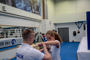 Tennis player Jelena (Alona) Ostanpenko trains with her boxing coach.