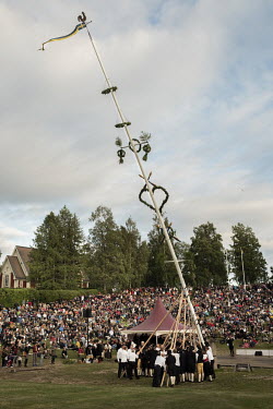 The raising of the maypole in Leksland, Sweden's most popular location for midsummer celebrations. Thousands of locals and tourists turn up every year to witness the ceremony and the festivities surro...