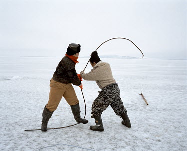 A metal rod that fishermen use to manoeuvre a net beneath the ice that covers the Aral Sea.