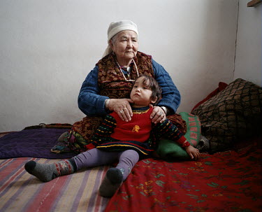 Sabira Ibragieva, who says she remembers when the Aral Sea began its retreat from her village in 1969, with her granddaughter
