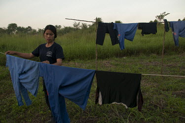 Srey Yen hangs out laundry at the HALO camp near the Chomka Chek minefield (part of the K-5 barrier minefiled) on the Thai-Cambodian border.