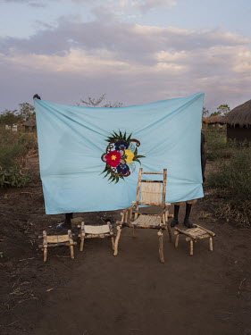 A Milaya (a traditional hand-decorated sheet) made by Mary Tabu (25) and furniture made by her brothers John Lomoro (18) and Thomas Lodongo (15) who recently arrived in Bidibidi.