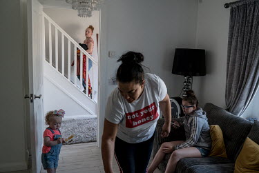 Nicola O'Neill with her children. Nicola lives in the Felden shared housing project on the outskirts of Belfast. Run by the Clanmil Housing Association the project aims to house people of different fa...