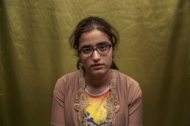 Yazidi Hana Shaker Faris (15) who has been in Shariya Camp for five months after three years as a captive of ISIS. She says that ISIS killed her father and an elder brother. While a sister, two other...